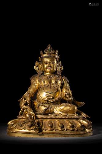 The gilding copper sitting yellow Jambhala statue