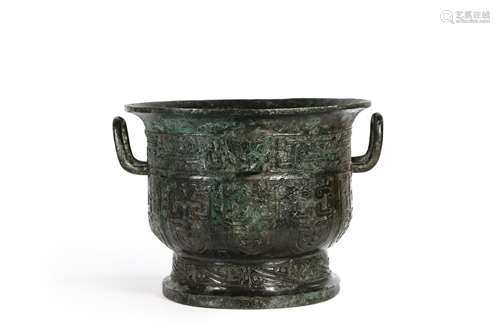 A beast face patterned bronze pot