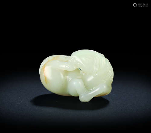 A white jade carved horse