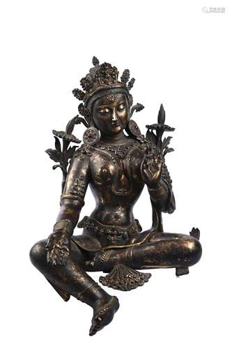 A copper sitting Guanyin statue