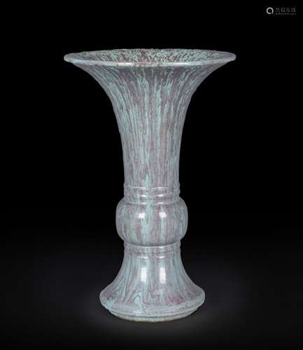 A glazed porcelain beaker vase