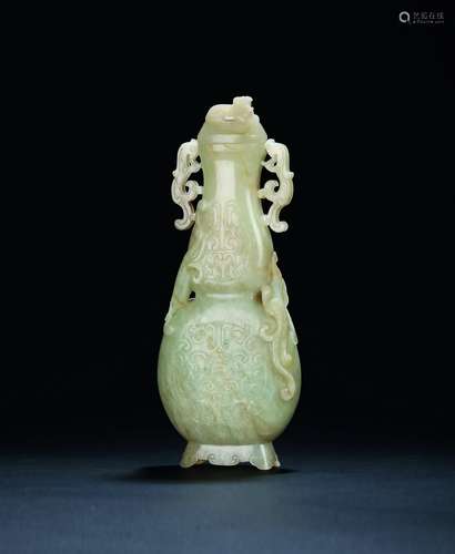 A white jade covered vase with double dragon-shaped ears