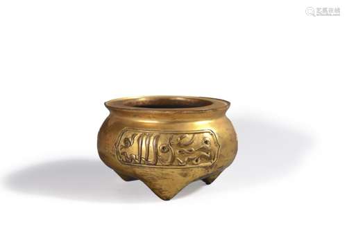 An inscribed three-legged gilding copper censer