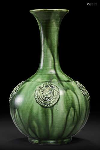 A green glazed porcelain vase