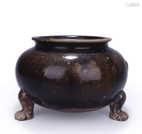 A black glazed porcelain three-legged censer