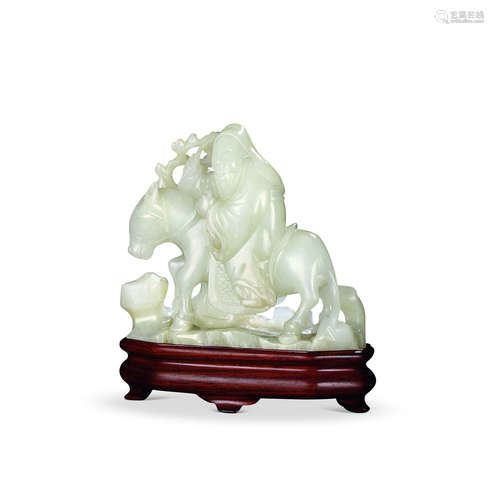 A white jade carved ornament