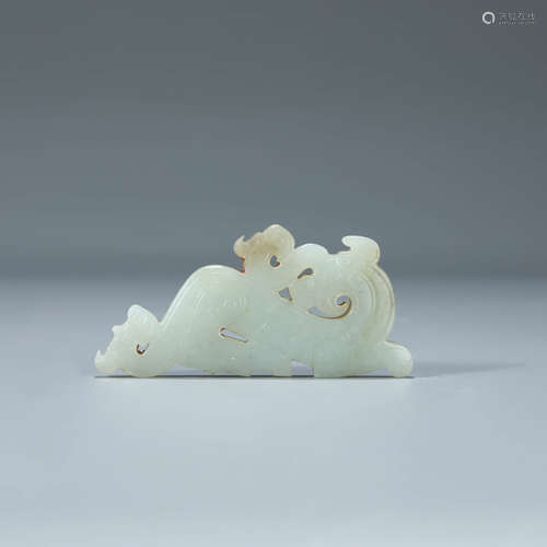 A CARVED WHITE JADE BEAST