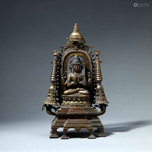 A GILT-BRONZE SEATED BODHISATTVA