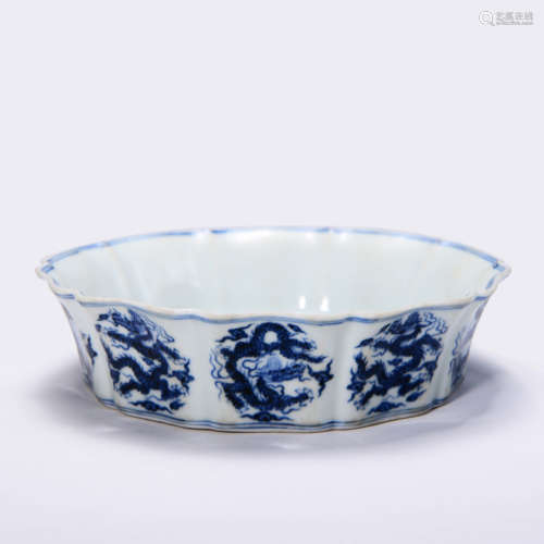 A BLUE AND WHITE DRAGON WASHER