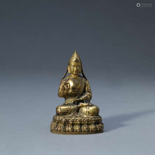 A GILT-BRONZE SEATED TSONG KHAPA