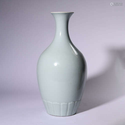 A CELADON GLAZED VASE