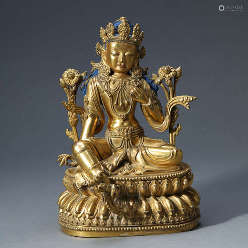 A GILT-BRONZE SEATED BODHISATTVA