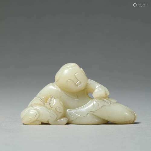 A CARVED WHITE JADE KID