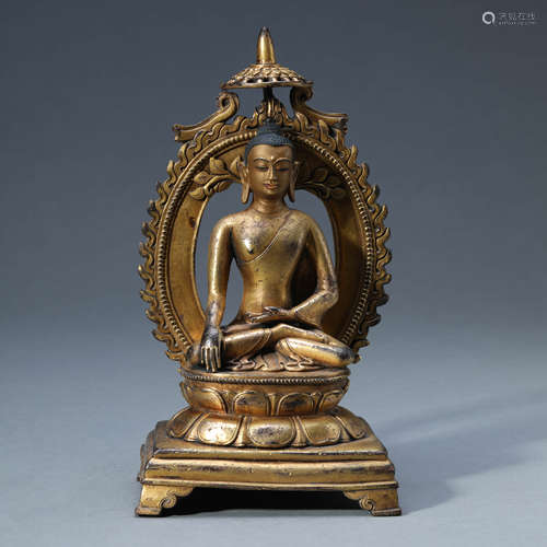 A GILT-BRONZE SEATED SHAKYAMUNI