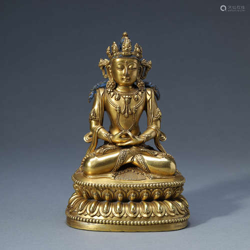 A GILT-BRONZE SEATED AMITAYUS