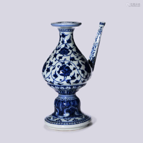 A BLUE AND WHITE KALASA