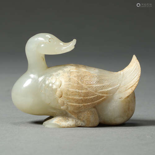 A CARVED WHITE JADE DUCK