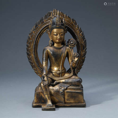 A GILT-BRONZE SEATED GUANYIN