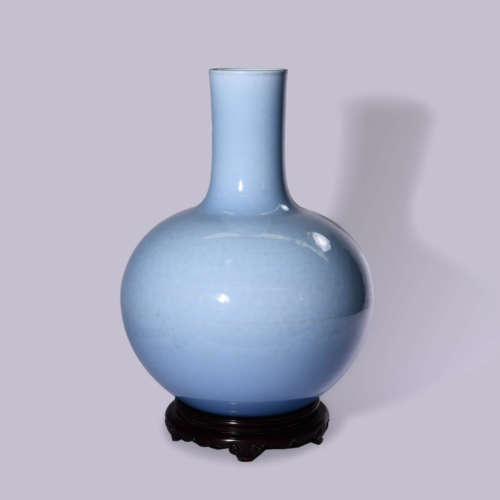 A SKY BLUE GLAZED GLOBULAR VASE