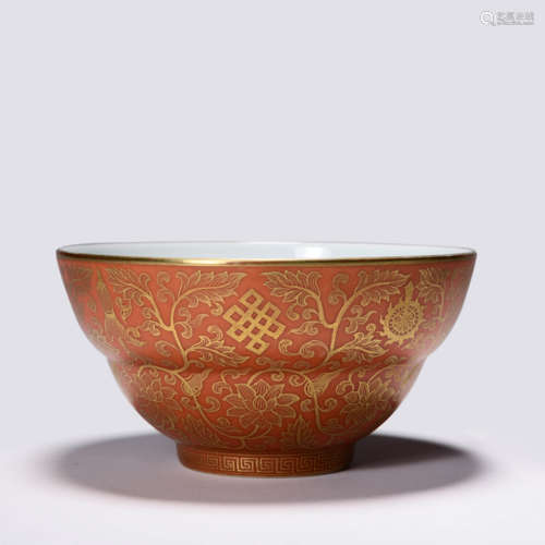 AN IRON RED AND GILT BOWL