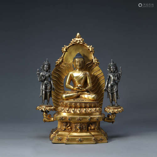 A GILT-BRONZE SEATED SHAKYAMUNI