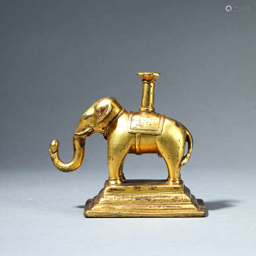 A GILT-BRONZE ELEPHANT