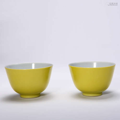 A PAIR OF YELLOW GLAZED CUPS