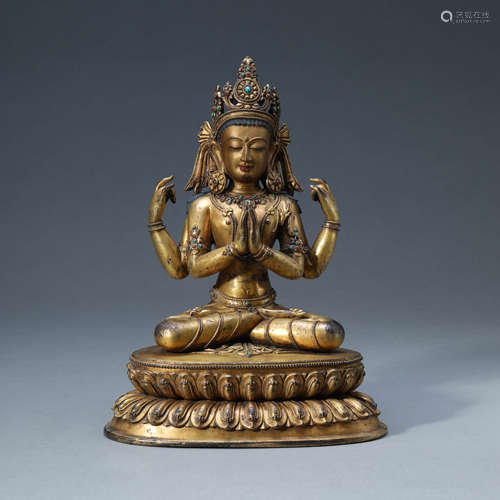 A GILT-BRONZE MULTI-HANDS BODHISATTVA