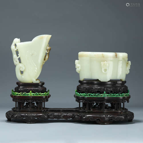 A CARVED WHITE JADE VESSELS WITH WOODEN STAND