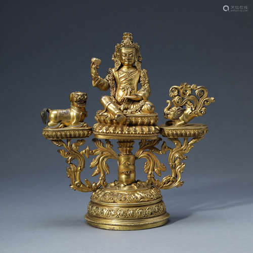 A GILT-BRONZE SEATED PADMASAMBHAVA