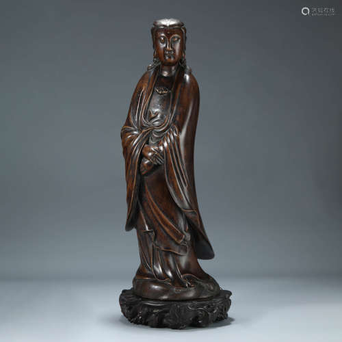 A CARVED CHENXIANG STANDING IMMORTAL