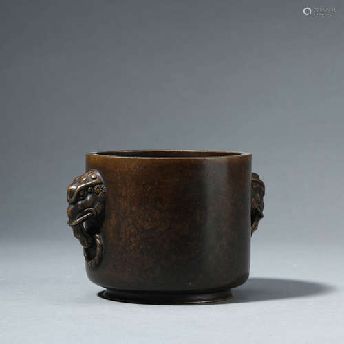 A BRONZE CENSER WITH DOUBLE HANDLES