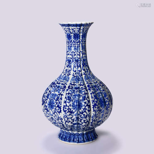 A BLUE AND WHITE LOTUS SCROLLS VASE