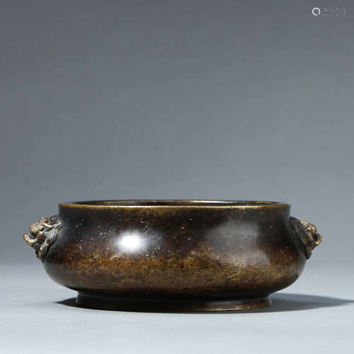 A BRONZE CENSER WITH DOUBLE HANDLES