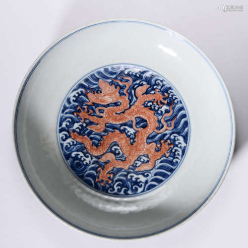 A UNDERGLAZE BLUE AND IRON RED DISH