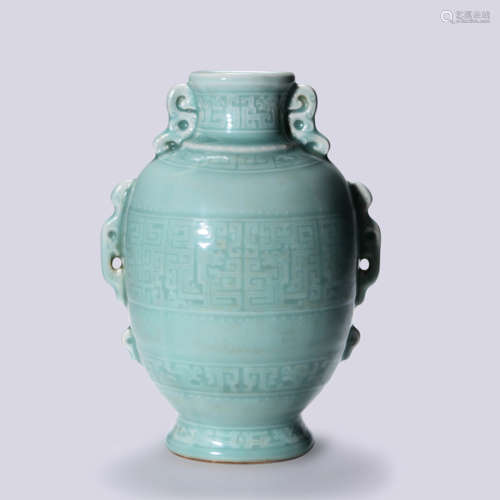 A CELADON GLAZED ZUN VASE