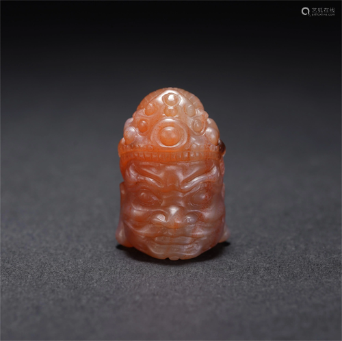 A CHIENSE AGATE CARVING BUDDHA HEAD