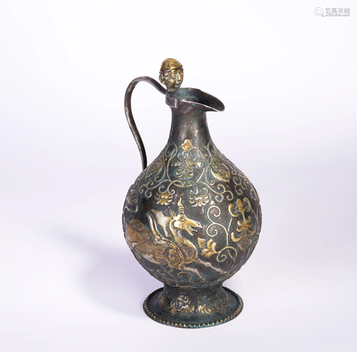 A CHINESE GILT SILVER AUSPICIOUS BEAST EWER