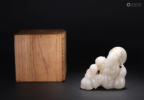 A CHINESE WHITE JADE FIGURAL DECORATION