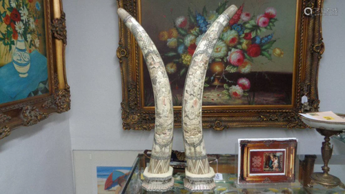 Pair of tall Chinese hand carved ox bone tusks. Measure