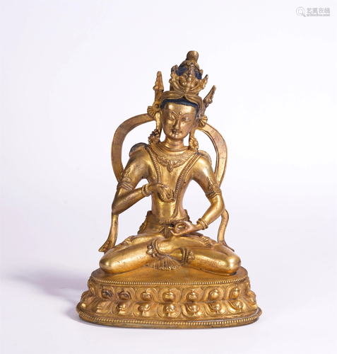 A CHINESE GILT BRONZE FIGURE OF SEATED BUDDHA