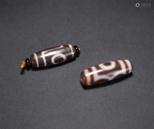 TWO CHINESE DZI BEADS