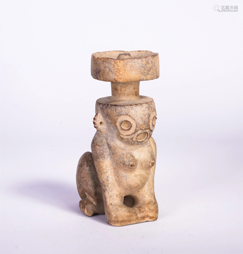 A CHINESE ARCHAIC JADE FIGURE