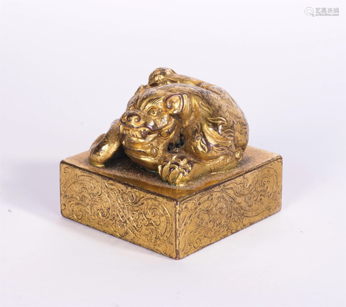 A CHINESE GILT BRONZE MYTHICAL BEAST SEAL