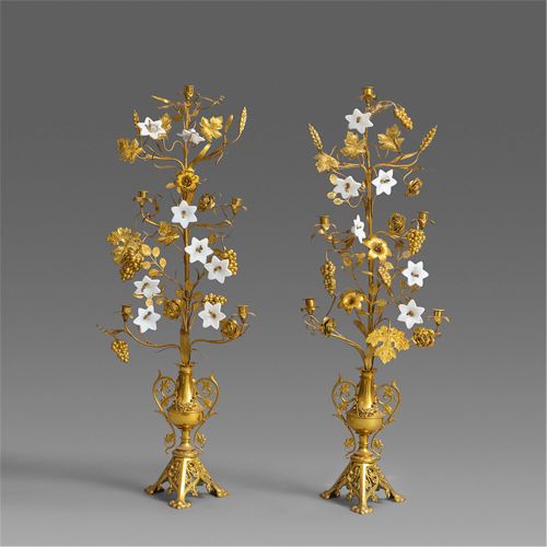 TWO WHITE PORCELAIN DECORATED BRASS CANDELABRUMS