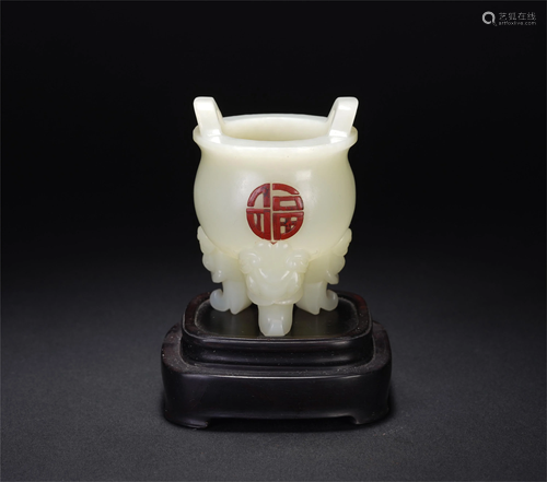 A CHINESE DOUBLE-HANDLED TRIPOD WHITE JADE INCENSE