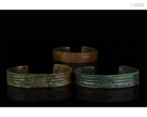 THREE MEDIEVAL DECORATED BRACELETS