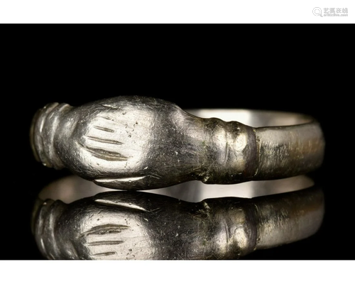 POST-MEDIEVAL SILVER BETROTHAL RING WITH CLASPED HA…