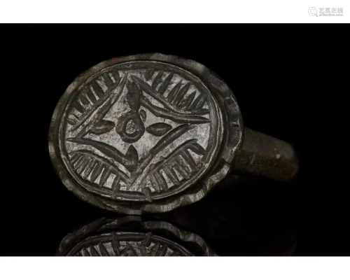 MEDIEVAL BRONZE RING WITH STYLISED STAR OF BETHLEHEM