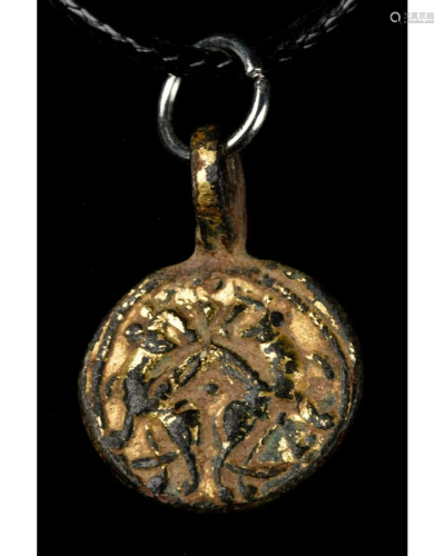 MEDIEVAL GILDED BRONZE PENDANT WITH TWO GRYPHONS